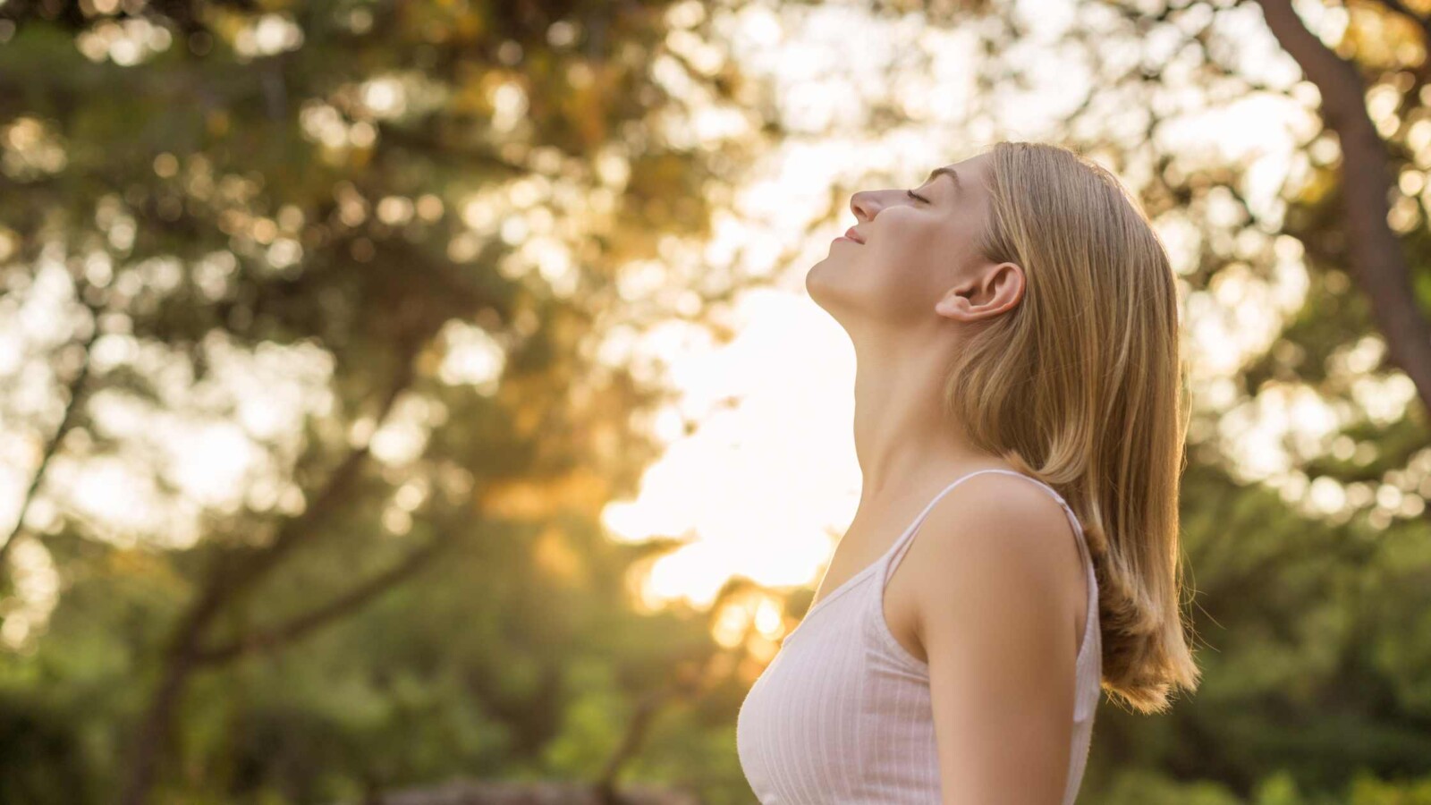 Person enjoying their breath in nature.