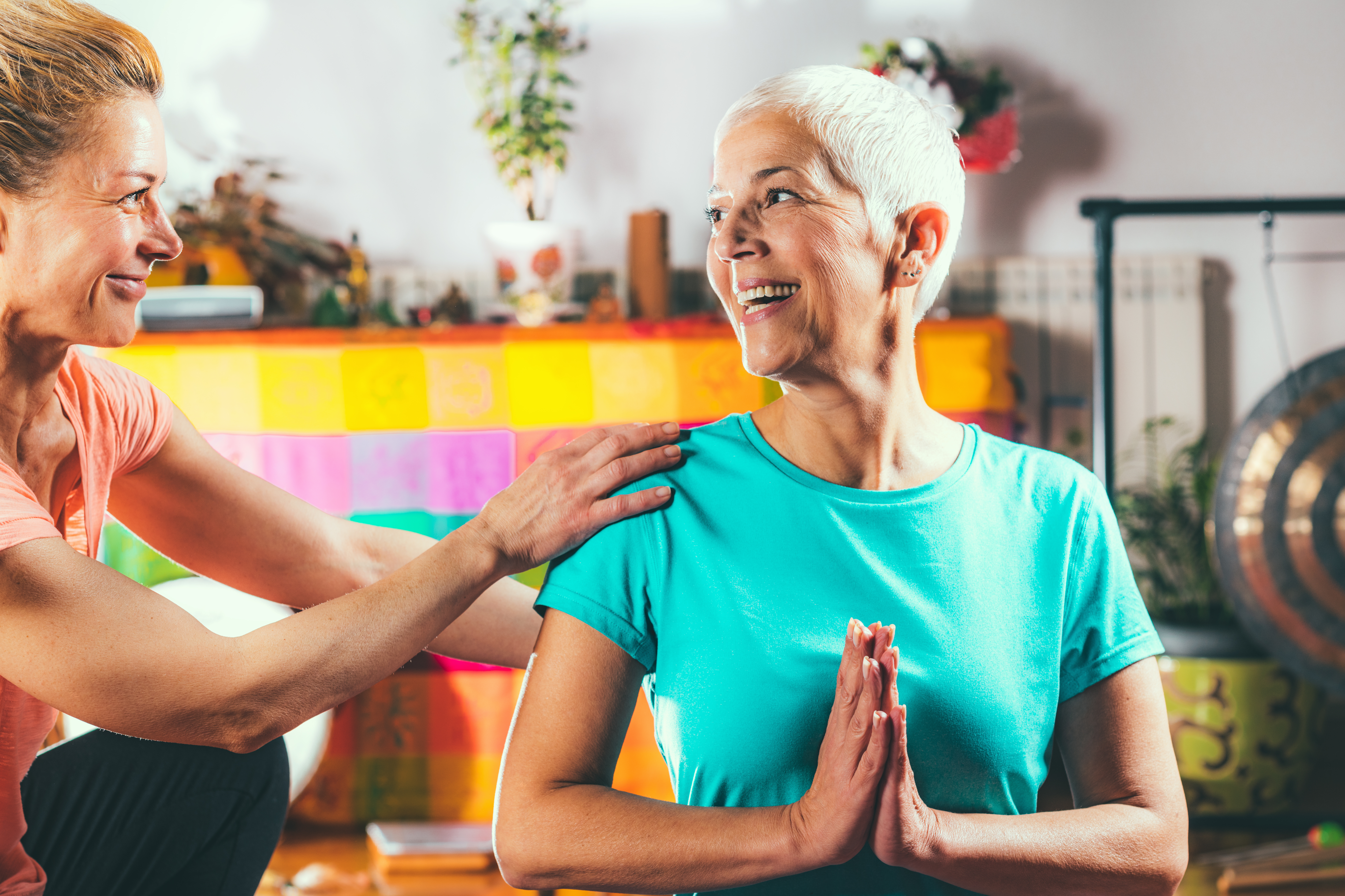 Senior woman on private yoga class