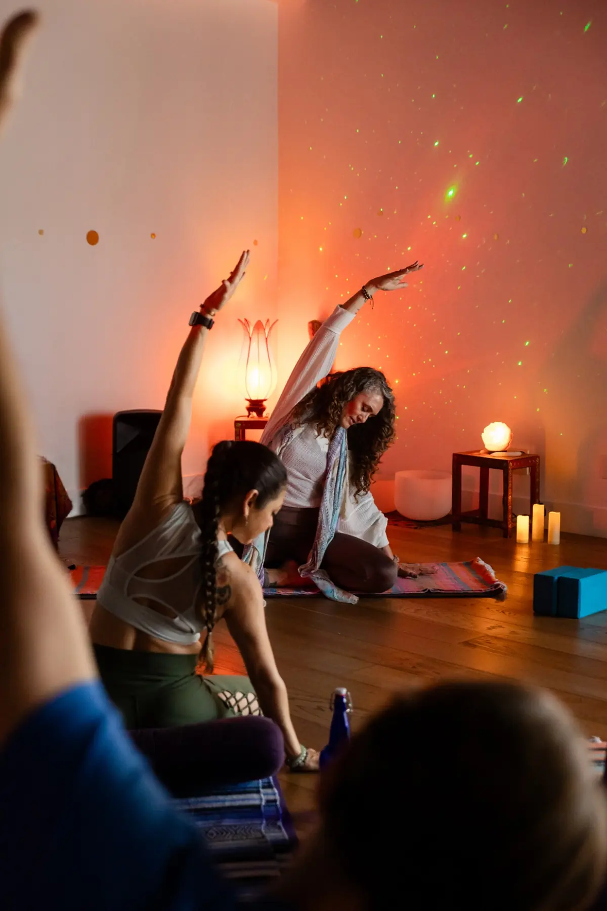 Students practicing a seated side stretch
